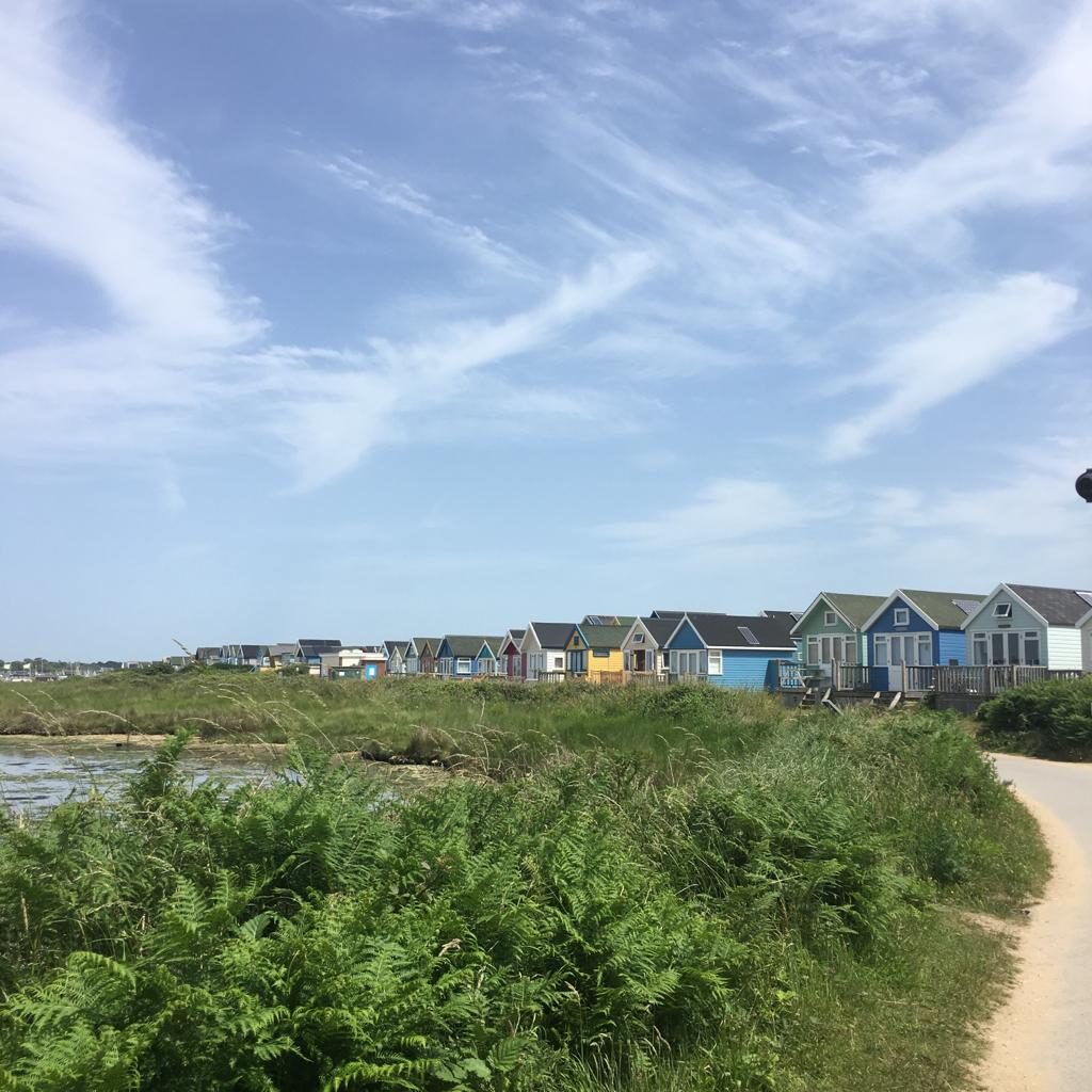 Hengistburyhead Beach huts in pastel colours