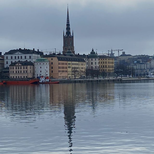 Photo of Stockholm riverside and building.