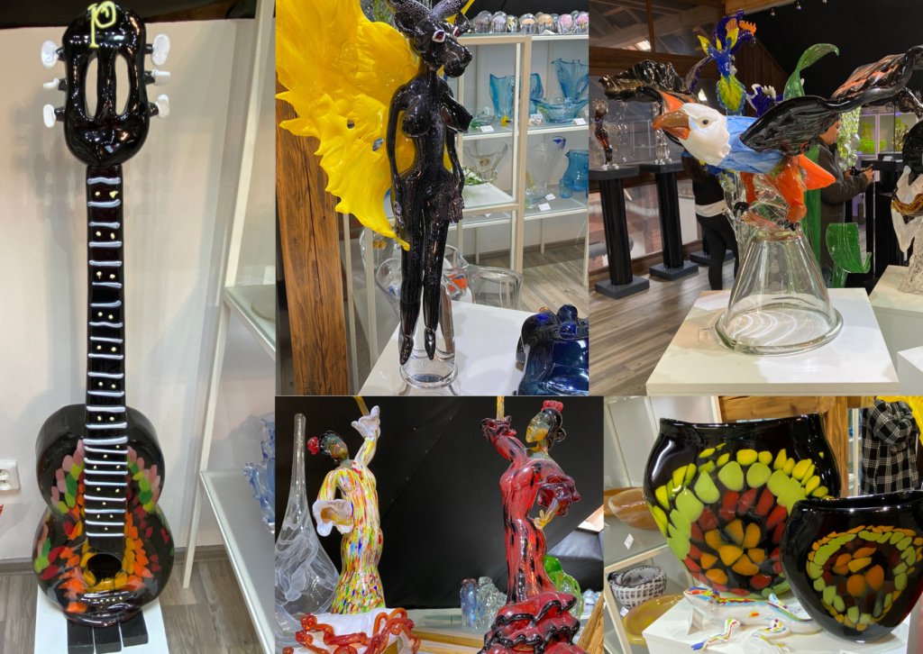 Birds, guitar, vases and ornate colourful glass sculpures on display at Cvikov glass works