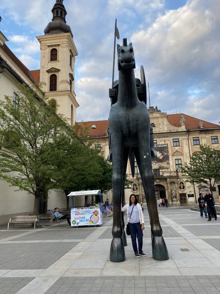 Statue of Jobst of Moravia, in Moravan square. It's a tall horse with long legs and a knight sitting on top of it