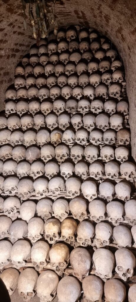 A wall of skulls on display at the ossuary in Brno