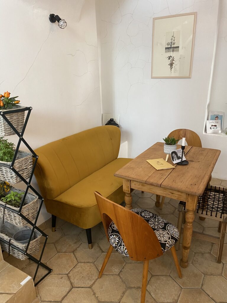 Musard sofa and pine table decor inside PF Cafe Brno Czech Republic