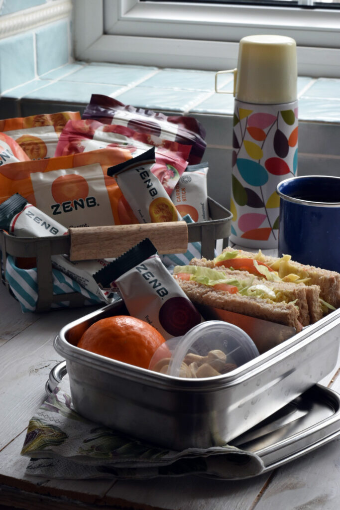 Lunch box with healthy snacks for travelling with kids