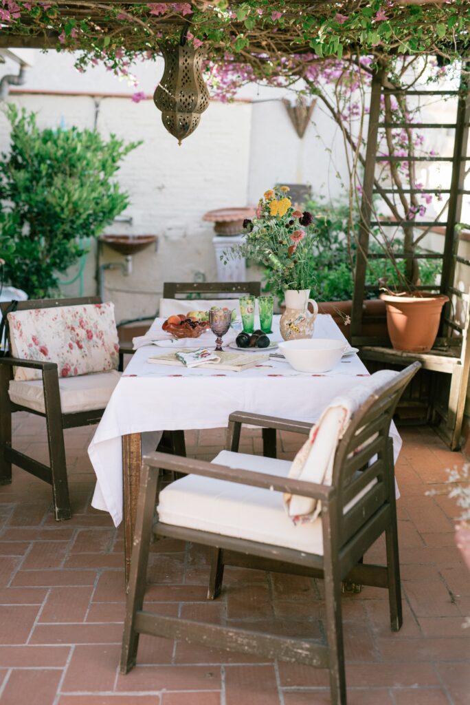 Dining al fresco in outdoor pation garden with Moroccan garden vibes