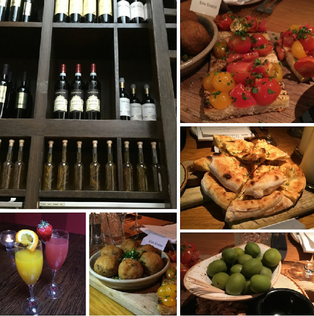 wines and food at the Mayfair Pizza co ,Pizza , bruschetta , wines and appetisers in the photo