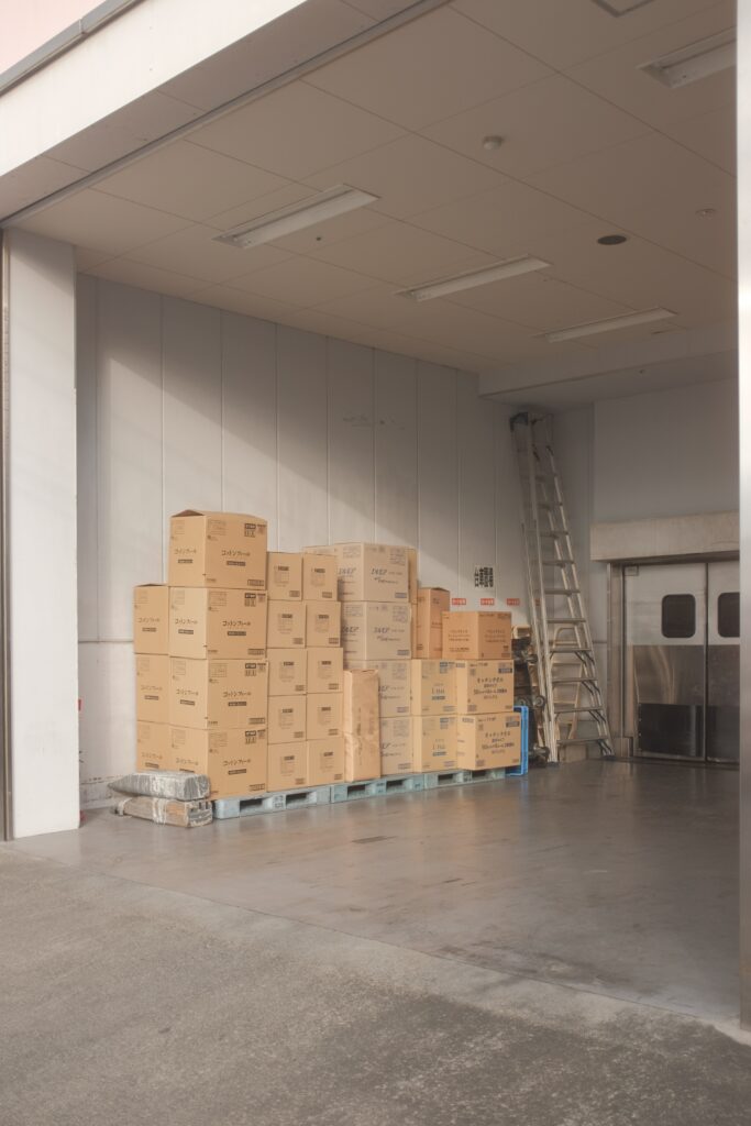Brown Storage boxes stacked in warehouse