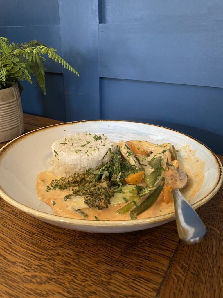 Vegan Thai red curry with coconut rice and cashew nuts