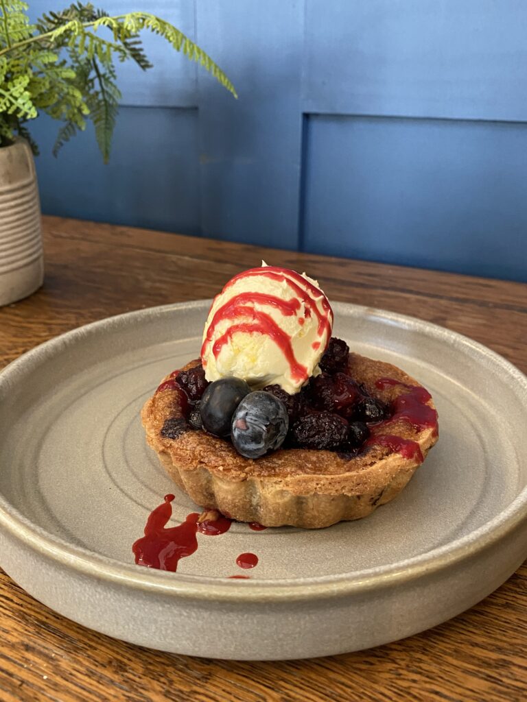 I opted for Blackcurrant tartlet with clotted cream and blackcurrant compote. Delicious dessert at Duke on the Test Inn Romsey.